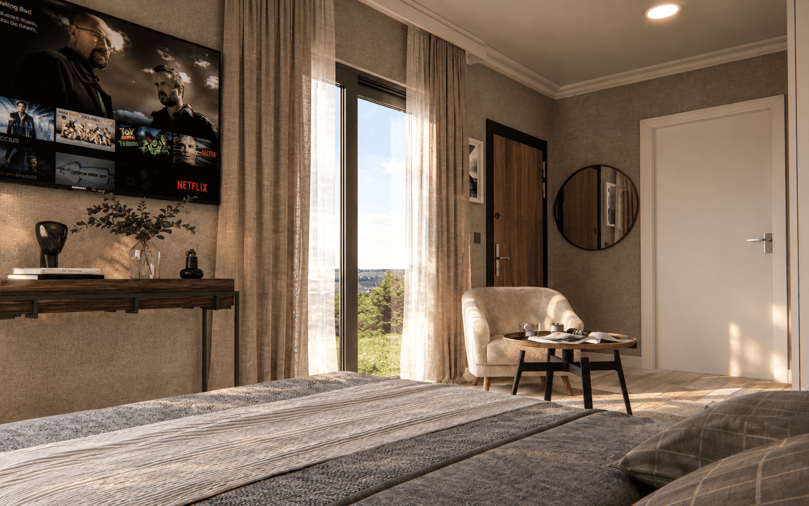 Bed facing the entry with wall-mounted television