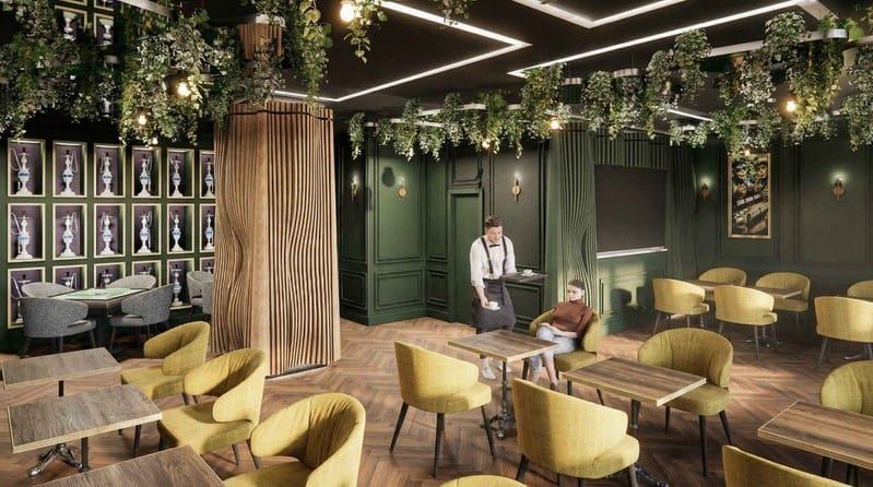 Reception and bar area framed by dark green paneling